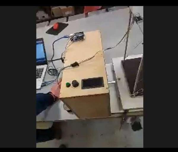 Electronics and controls connected to a student-built structural model